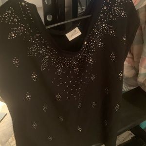 Black shirt with silver jewelry